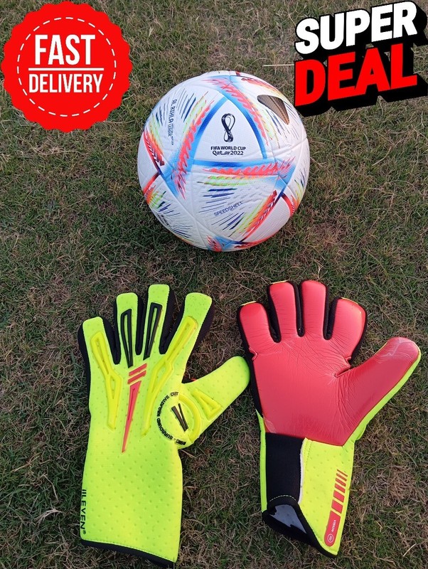 New FIFA 2022 Ball with Neon Goalkeeper Gloves on Grass Field
